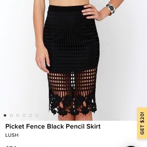 Sexy cage patterned black skirt with flower detail